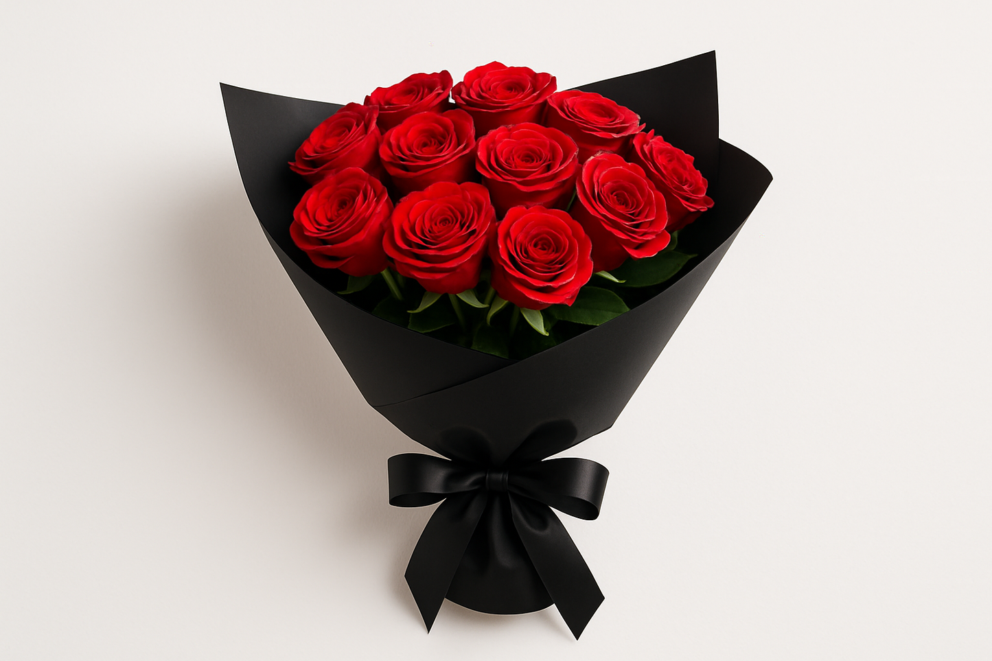 I need a bouquet of a dozen roses wrapped in black paper. I need it in a white background.